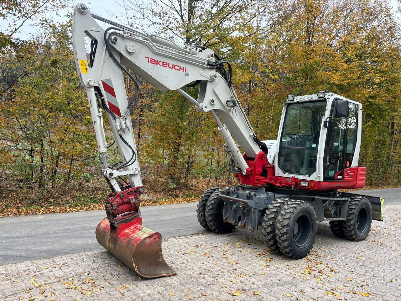 TAKEUCHI TB 295 W - Riteņu ekskavators: foto 3 TAKEUCHI TB 295 W - Riteņu ekskavators: foto 3