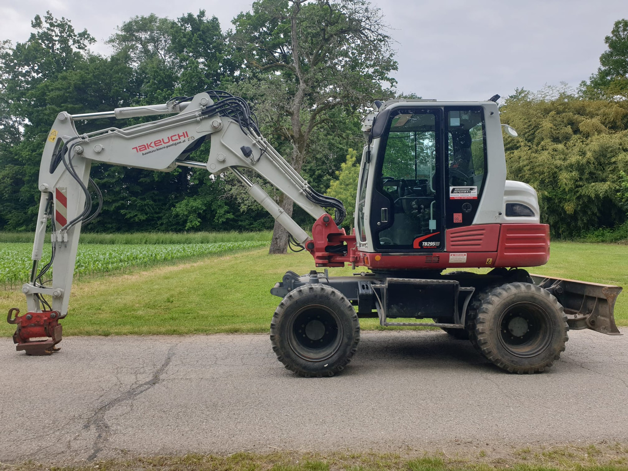 TAKEUCHI TB 295W - Riteņu ekskavators: foto 1 TAKEUCHI TB 295W - Riteņu ekskavators: foto 1