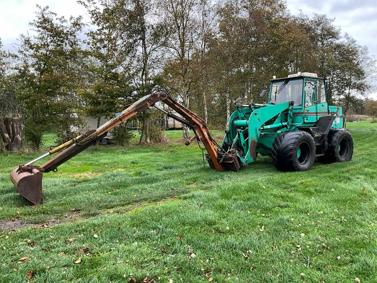 Ahlmann 1996 AHLMANN AZ18 SHOVEL - Riteņu iekrāvējs: foto 1 Ahlmann 1996 AHLMANN AZ18 SHOVEL - Riteņu iekrāvējs: foto 1