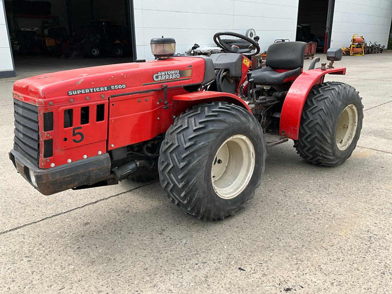 Antonio Carraro Supertigre 5500 - Traktors: foto 1 Antonio Carraro Supertigre 5500 - Traktors: foto 1