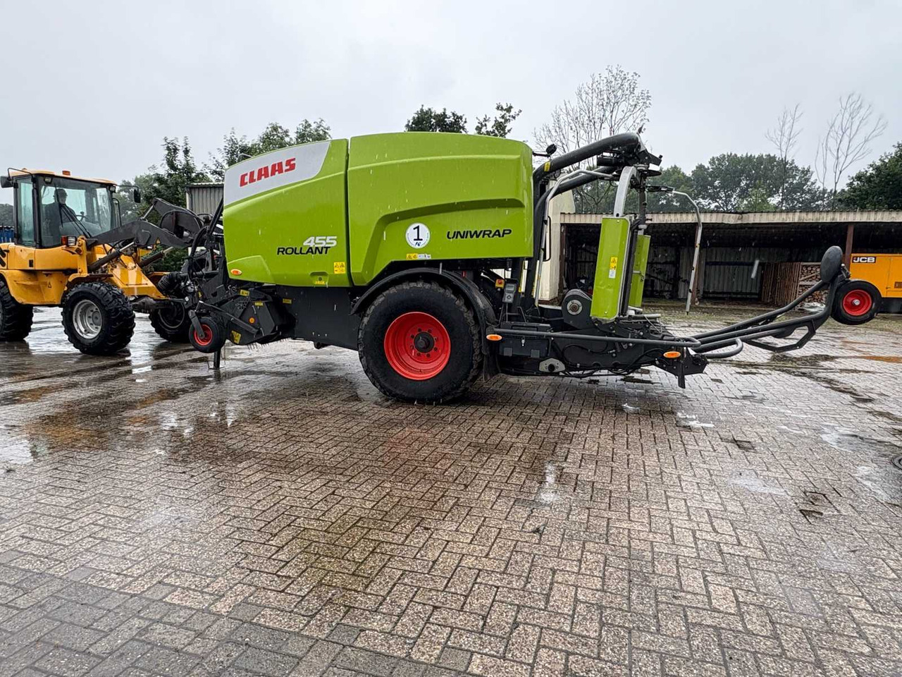 CLAAS ROLLANT 455 UNIWRAP 750 - Rituļu prese: foto 1 CLAAS ROLLANT 455 UNIWRAP 750 - Rituļu prese: foto 1