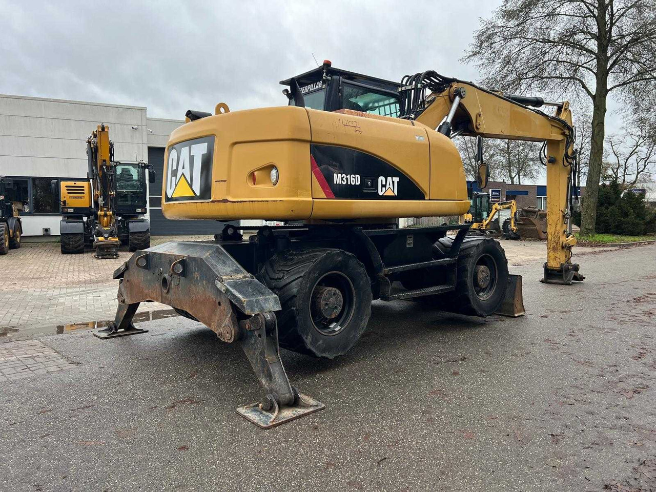 Caterpillar M316D - Riteņu ekskavators: foto 5 Caterpillar M316D - Riteņu ekskavators: foto 5