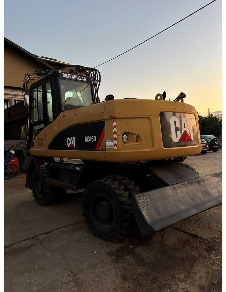 Caterpillar M316D - Riteņu ekskavators: foto 5 Caterpillar M316D - Riteņu ekskavators: foto 5