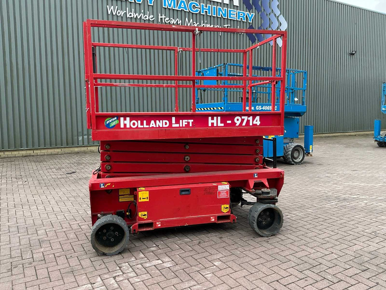 Holland lift HL-9714 - Pacēlājs: foto 2 Holland lift HL-9714 - Pacēlājs: foto 2