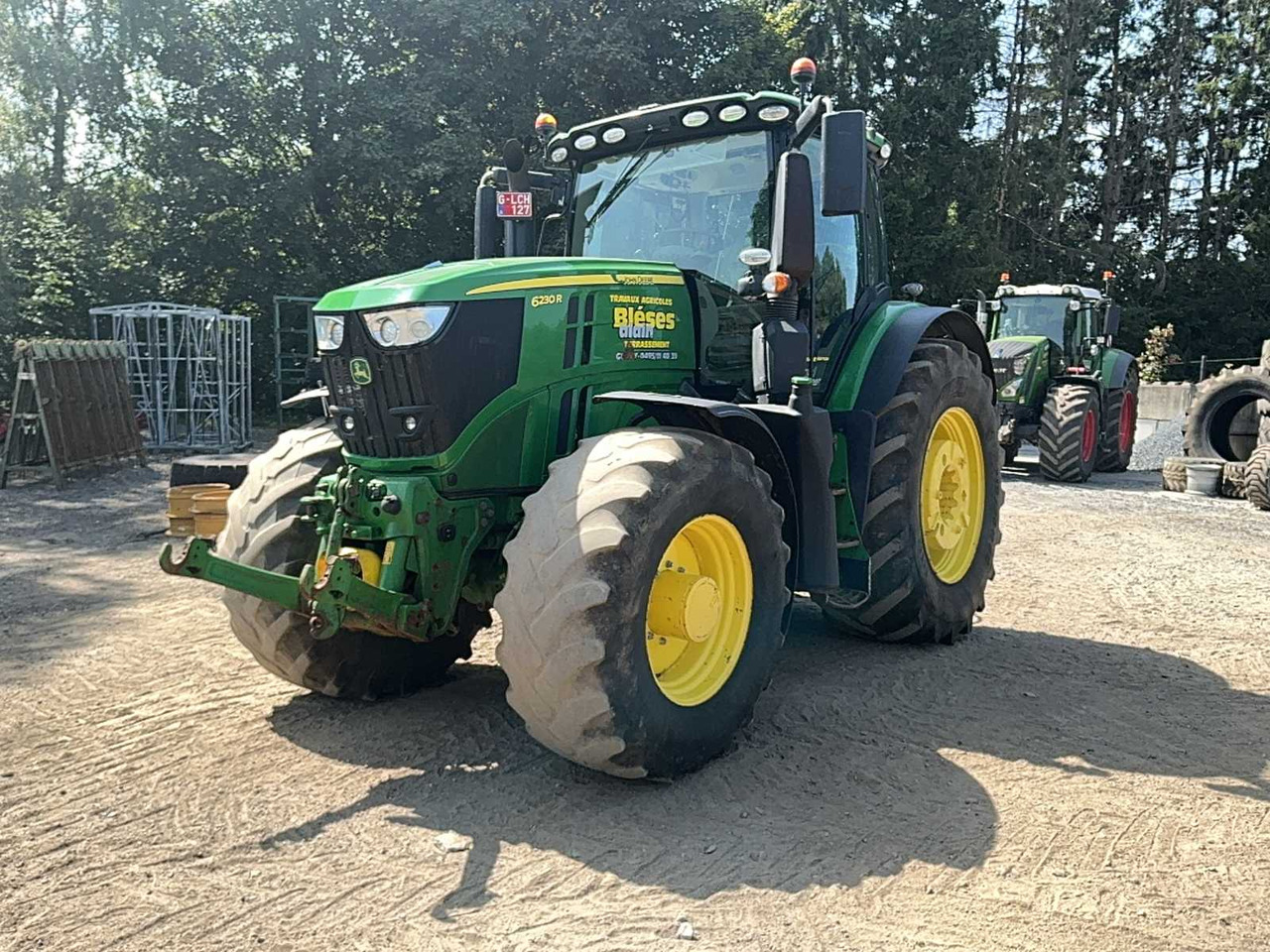 John Deere 6230 R 4AWD - Traktors: foto 1 John Deere 6230 R 4AWD - Traktors: foto 1