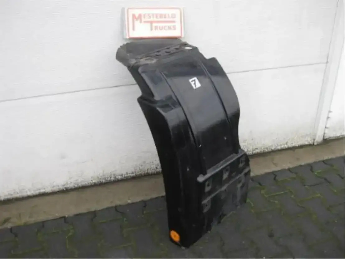 Mercedes-Benz Voorwielspatbord MP2 links - Kabīne un interjers - Kravas automašīna: foto 1 Mercedes-Benz Voorwielspatbord MP2 links - Kabīne un interjers - Kravas automašīna: foto 1