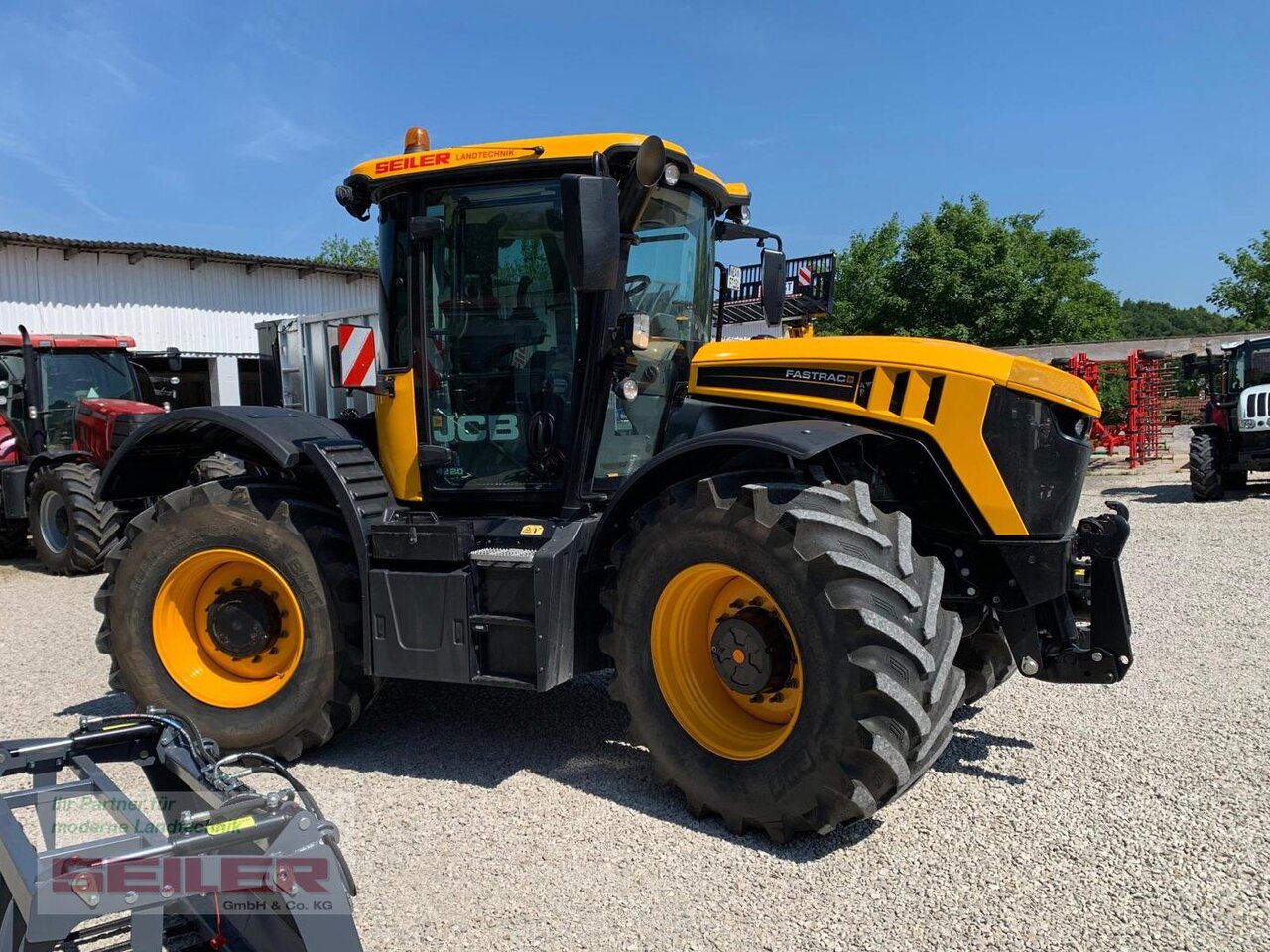JCB Fastrac 4220 - Traktors: foto 3 JCB Fastrac 4220 - Traktors: foto 3