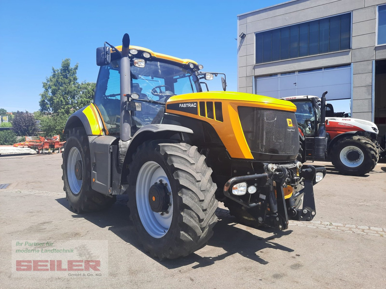 JCB Fastrac 8310 - Traktors: foto 4 JCB Fastrac 8310 - Traktors: foto 4