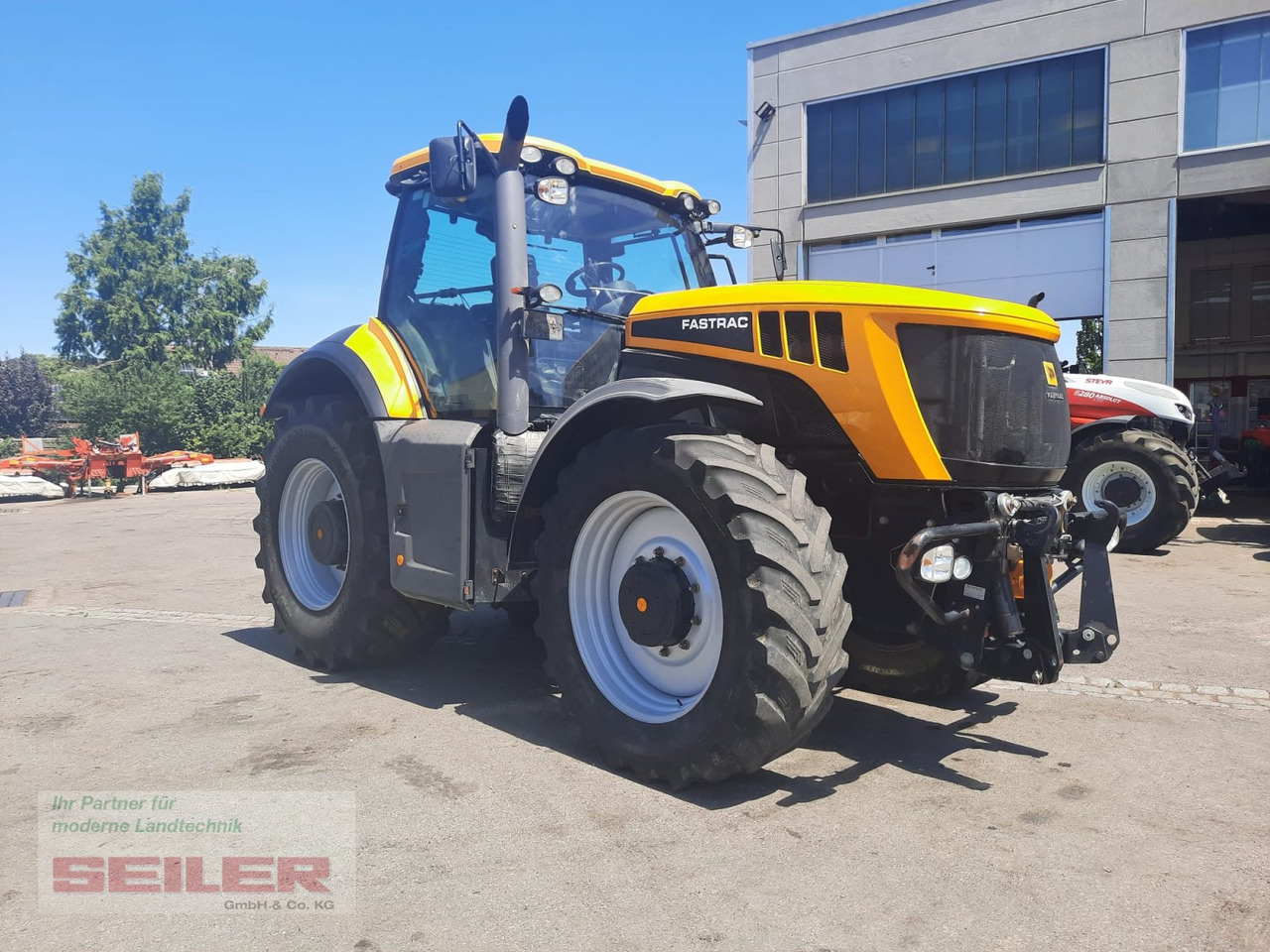 JCB Fastrac 8310 - Traktors: foto 2 JCB Fastrac 8310 - Traktors: foto 2