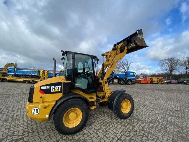 Caterpillar 908M, 4+1 Schaufel, Palettengabel, wenig Std. - Riteņu iekrāvējs: foto 5 Caterpillar 908M, 4+1 Schaufel, Palettengabel, wenig Std. - Riteņu iekrāvējs: foto 5