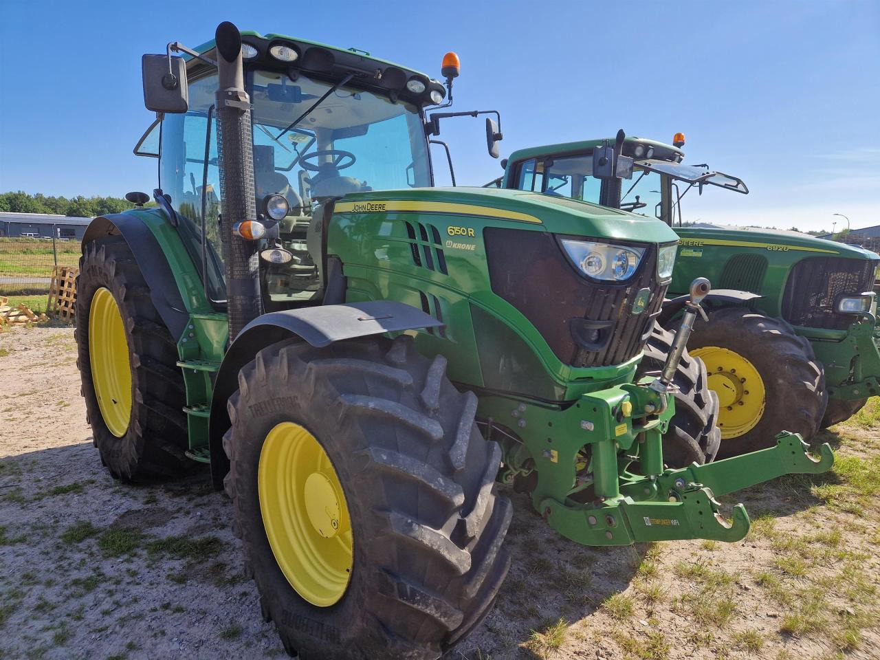 John Deere 6150R - Traktors: foto 1 John Deere 6150R - Traktors: foto 1