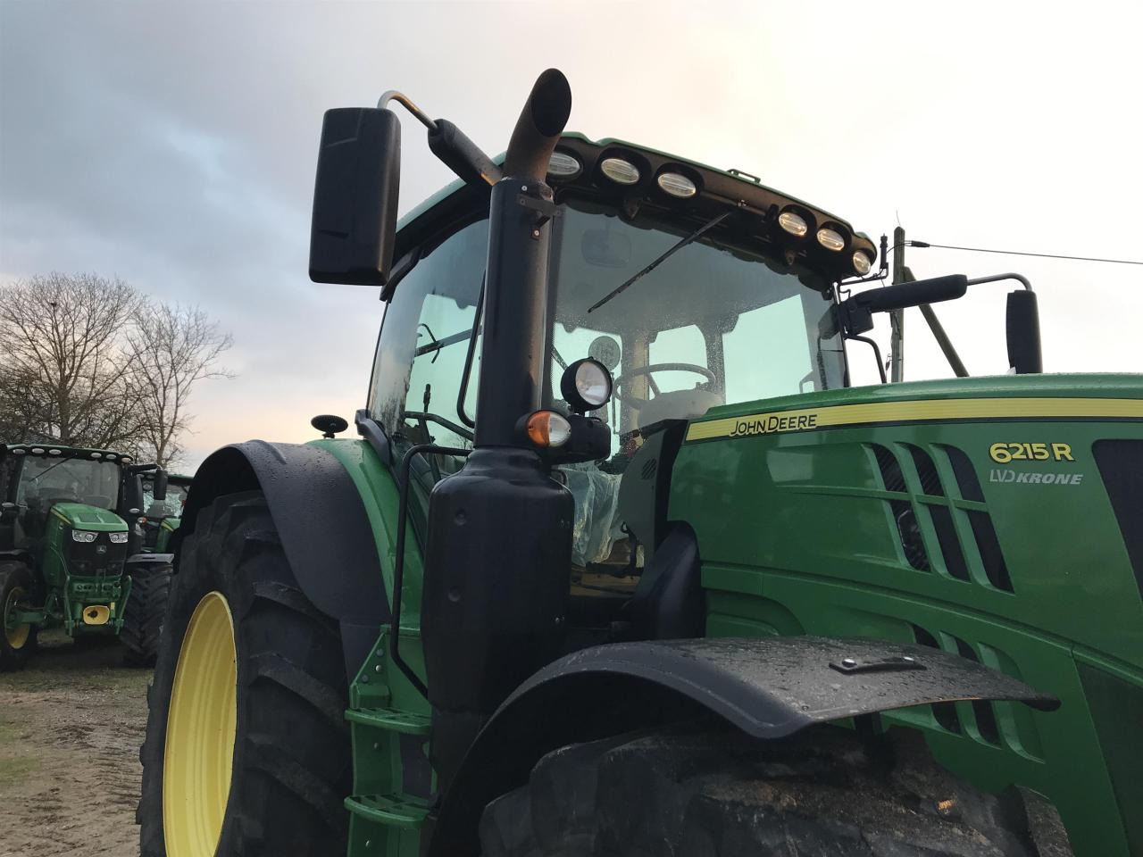John Deere 6215R - Traktors: foto 2 John Deere 6215R - Traktors: foto 2
