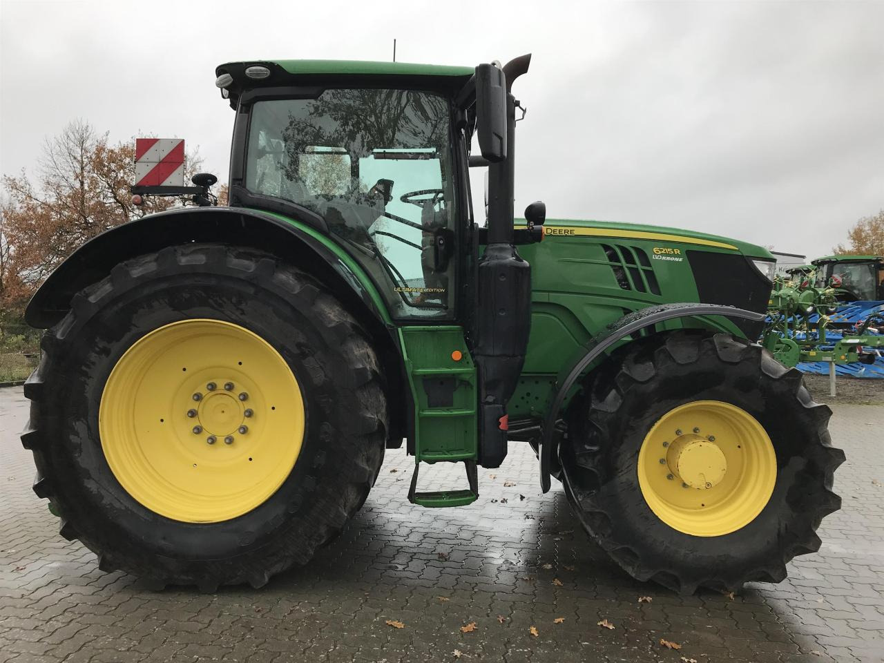 John Deere 6215R - Traktors: foto 2 John Deere 6215R - Traktors: foto 2