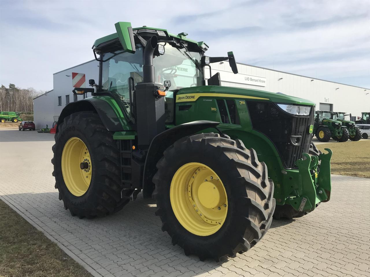 John Deere 7R 310 - Traktors: foto 2 John Deere 7R 310 - Traktors: foto 2