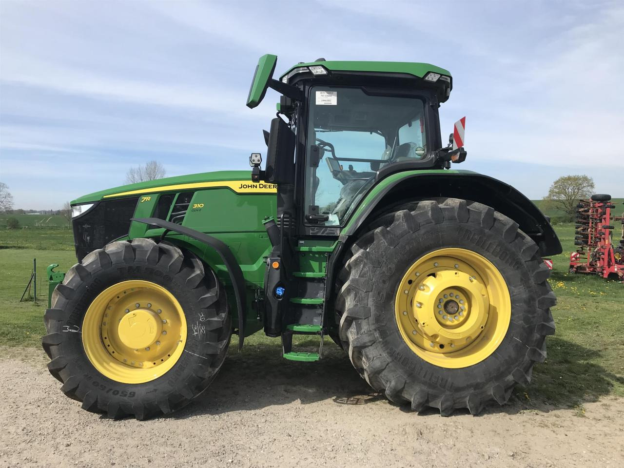 John Deere 7R 310 - Traktors: foto 1 John Deere 7R 310 - Traktors: foto 1