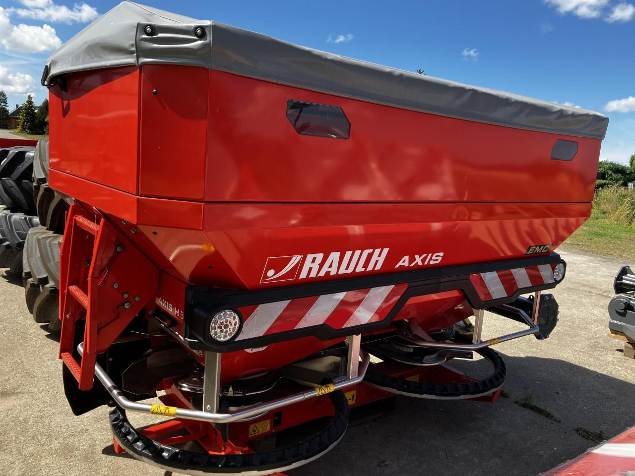 Rauch Axis H 50.2 EMC + W - Minerālmēslu izkliedētājs: foto 1 Rauch Axis H 50.2 EMC + W - Minerālmēslu izkliedētājs: foto 1