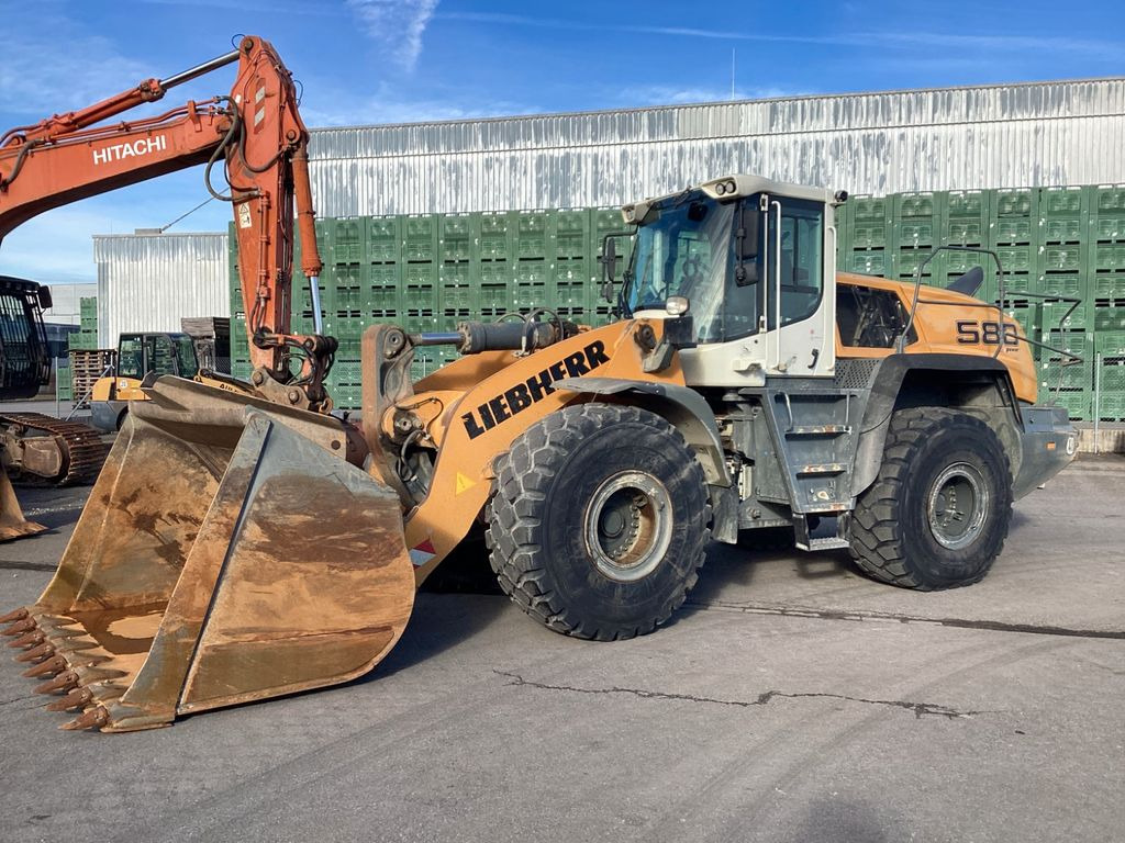 Riteņu iekrāvējs Liebherr L580 Xpower IV Zentralschmierung 5,4 kubik Schau: foto 12