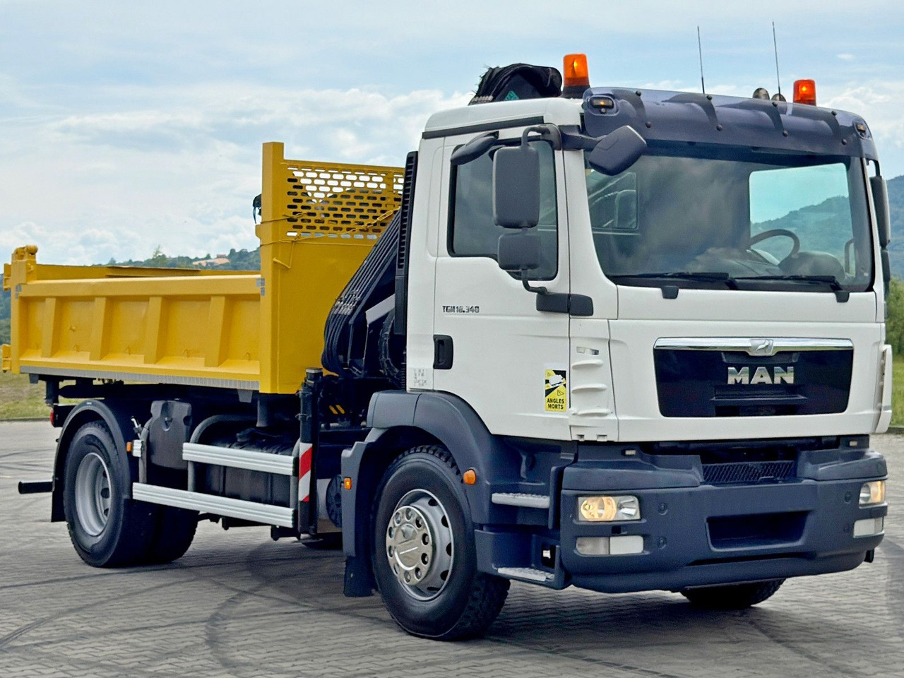 MAN TGM 18.340* KIPPER 4,05m*HIAB 111 B-2 HIDUO/FUNK - Kravas automašīna pašizgāzējs, Kravas auto ar manipulatoru: foto 4 MAN TGM 18.340* KIPPER 4,05m*HIAB 111 B-2 HIDUO/FUNK - Kravas automašīna pašizgāzējs, Kravas auto ar manipulatoru: foto 4