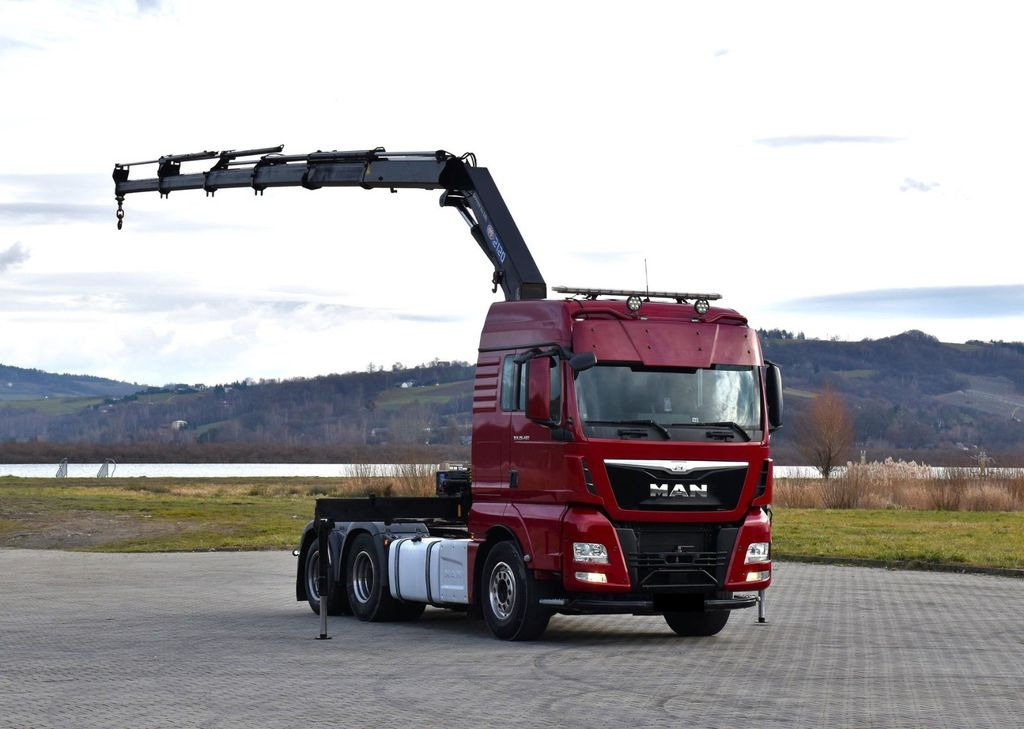 MAN TGX 28.480 Sattelzugmaschine + HMF 2120 K5/FUNK - Kravas auto ar manipulatoru: foto 2 MAN TGX 28.480 Sattelzugmaschine + HMF 2120 K5/FUNK - Kravas auto ar manipulatoru: foto 2