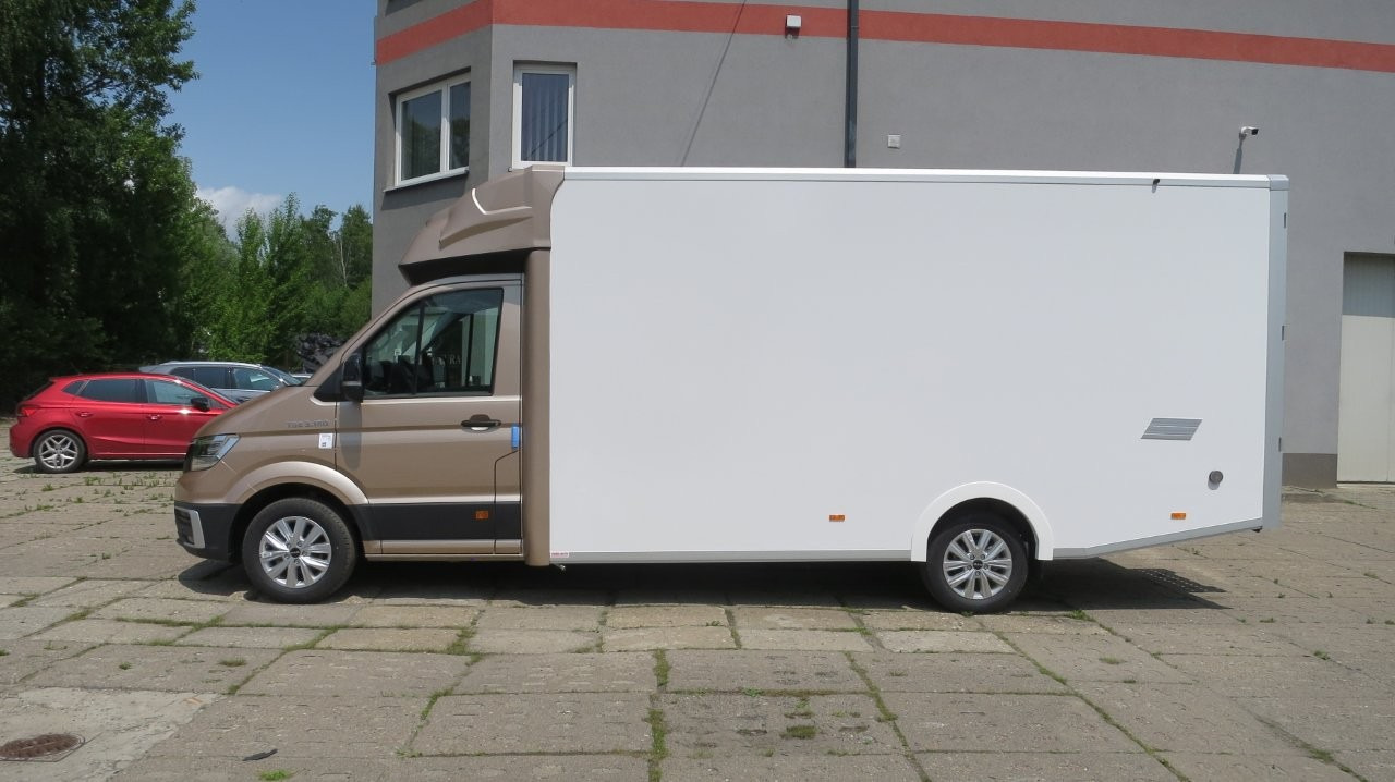 MAN TGE 3.180 Koffer mit Schlafbett - Furgons ar slēgtā virsbūve, Kravas-pasažieru furgons: foto 2 MAN TGE 3.180 Koffer mit Schlafbett - Furgons ar slēgtā virsbūve, Kravas-pasažieru furgons: foto 2