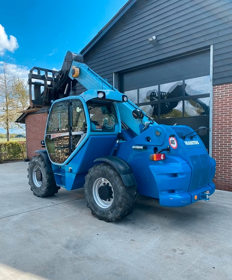 Manitou MHT 780 - Teleskopiskais riteņu iekrāvējs: foto 3 Manitou MHT 780 - Teleskopiskais riteņu iekrāvējs: foto 3