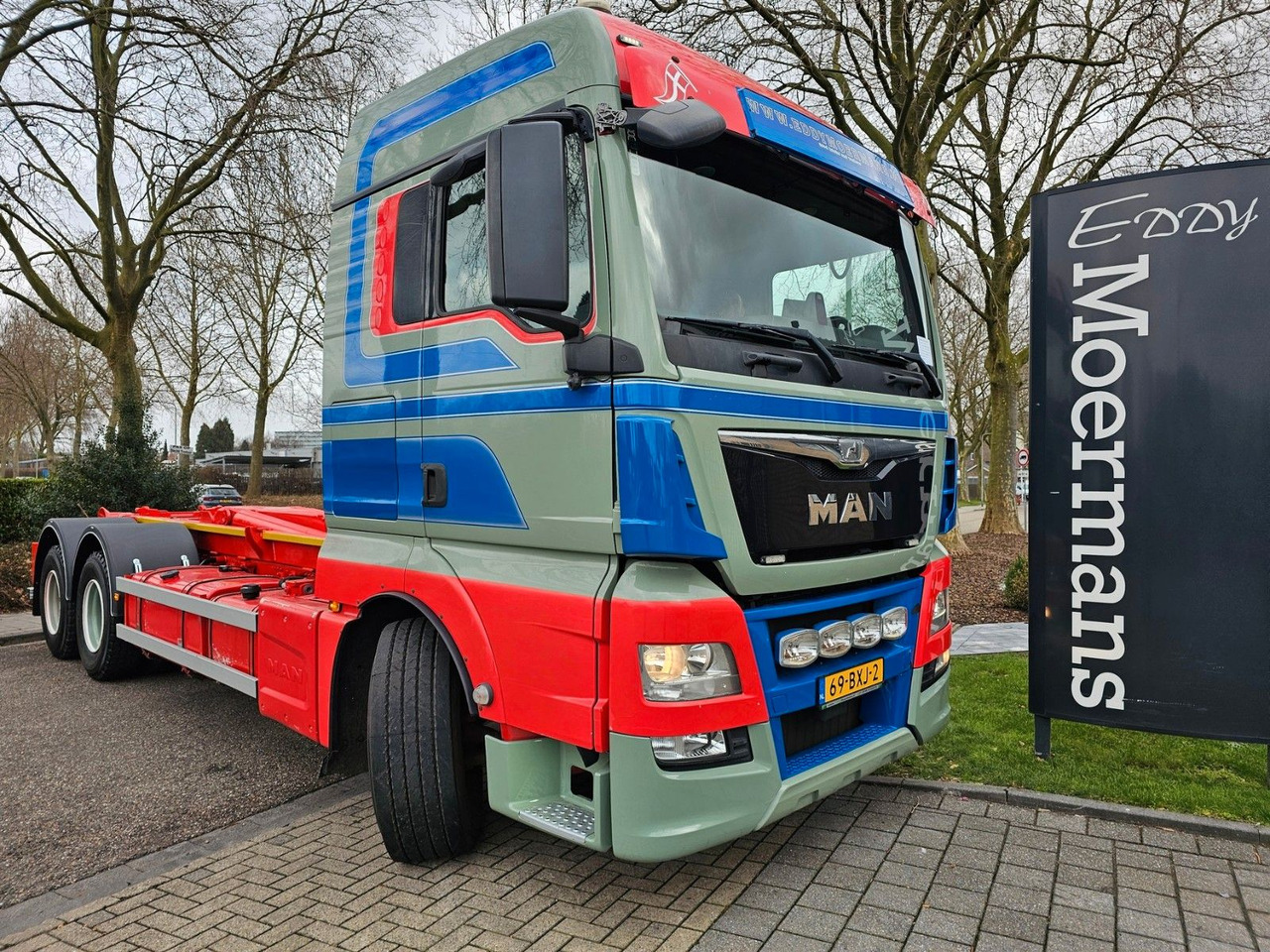 MAN TGX 26.560 XLX 6x4 Abrollkipper - Pacēlājs ar āķi: foto 1 MAN TGX 26.560 XLX 6x4 Abrollkipper - Pacēlājs ar āķi: foto 1