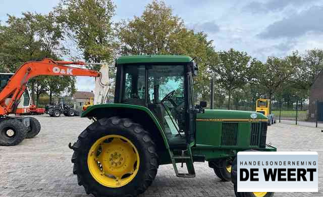 John Deere 6100 - Traktors: foto 4 John Deere 6100 - Traktors: foto 4