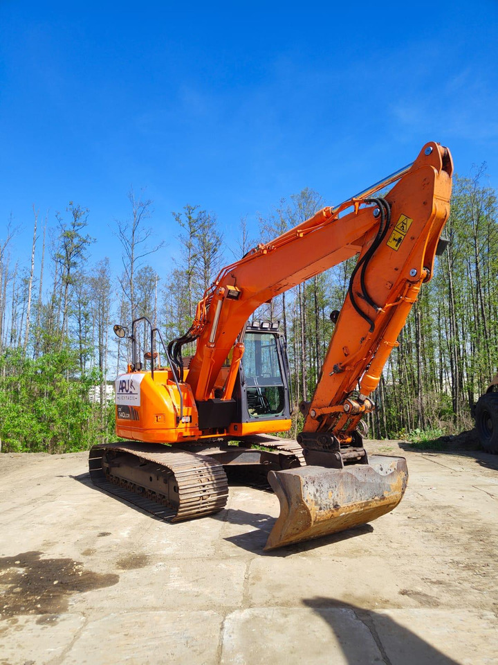 DOOSAN DX140LCR-3 - Kāpurķēžu ekskavators: foto 1 DOOSAN DX140LCR-3 - Kāpurķēžu ekskavators: foto 1