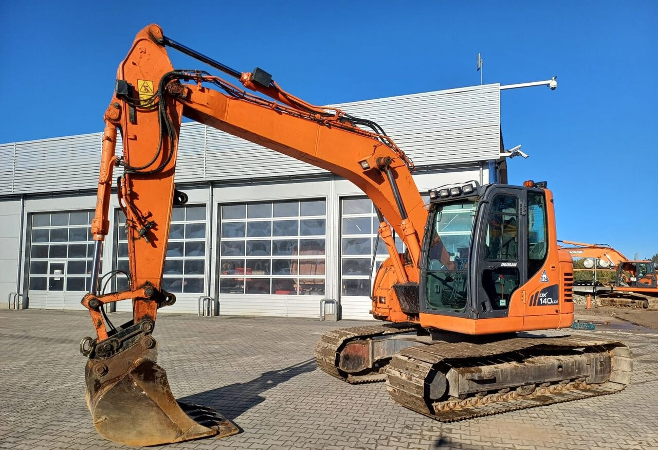 Doosan DX140LCR-3 - Kāpurķēžu ekskavators: foto 1 Doosan DX140LCR-3 - Kāpurķēžu ekskavators: foto 1