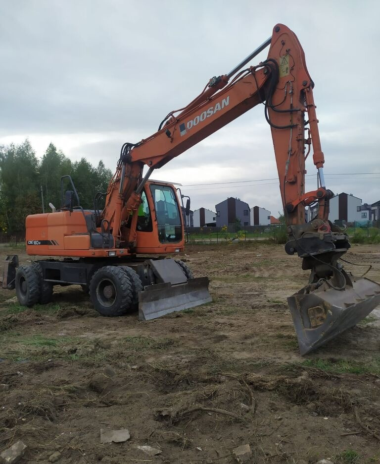 Doosan DX160 w - Riteņu ekskavators: foto 4 Doosan DX160 w - Riteņu ekskavators: foto 4