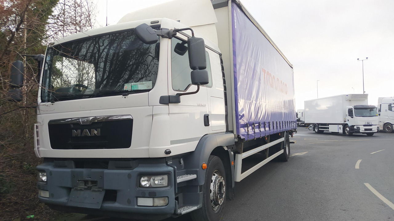 2014 – Man TGM 18.250 2DR AUTO 4X2 - Kravas automašīna ar tentu: foto 1 2014 – Man TGM 18.250 2DR AUTO 4X2 - Kravas automašīna ar tentu: foto 1
