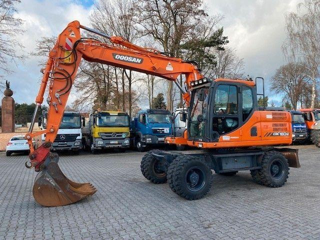 Doosan DX 160 W-3 - Riteņu ekskavators: foto 1 Doosan DX 160 W-3 - Riteņu ekskavators: foto 1