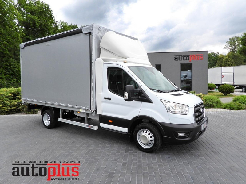 Ford TRANSIT PLANDEKA 8 PALET TEMPOMAT LEDY BLIŹNIACZE KOŁA KLIMATYZ - Furgons ar tentu: foto 1 Ford TRANSIT PLANDEKA 8 PALET TEMPOMAT LEDY BLIŹNIACZE KOŁA KLIMATYZ - Furgons ar tentu: foto 1