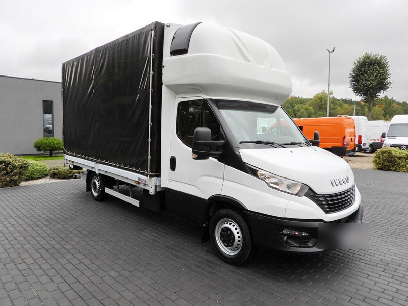 Iveco DAILY 35S18 PLANDEKA WINDA 8 PALET WEBASTO TEMPOMAT KLIMATYZACJA - Furgons ar tentu: foto 4 Iveco DAILY 35S18 PLANDEKA WINDA 8 PALET WEBASTO TEMPOMAT KLIMATYZACJA - Furgons ar tentu: foto 4