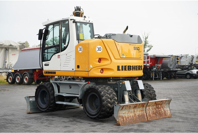 Liebherr 910 COMPACT LITRONIC  / KOPARKA KOŁOWA / KLIMATYZACJA / KAMERA - Riteņu ekskavators: foto 3 Liebherr 910 COMPACT LITRONIC  / KOPARKA KOŁOWA / KLIMATYZACJA / KAMERA - Riteņu ekskavators: foto 3