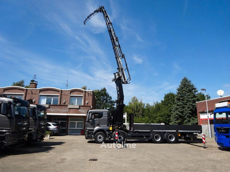 MAN 35.510 - Flatbed+crane - Bortu kravas automašīna/ Platforma, Kravas auto ar manipulatoru: foto 1 MAN 35.510 - Flatbed+crane - Bortu kravas automašīna/ Platforma, Kravas auto ar manipulatoru: foto 1
