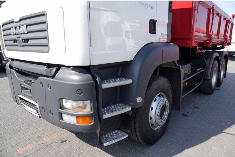 Kravas automašīna pašizgāzējs MAN TGA 33.390 / 6X4 / WYWROTKA 2 STRONNA / HYDROBURTA / MANUAL / SP: foto 17 Kravas automašīna pašizgāzējs MAN TGA 33.390 / 6X4 / WYWROTKA 2 STRONNA / HYDROBURTA / MANUAL / SP: foto 17