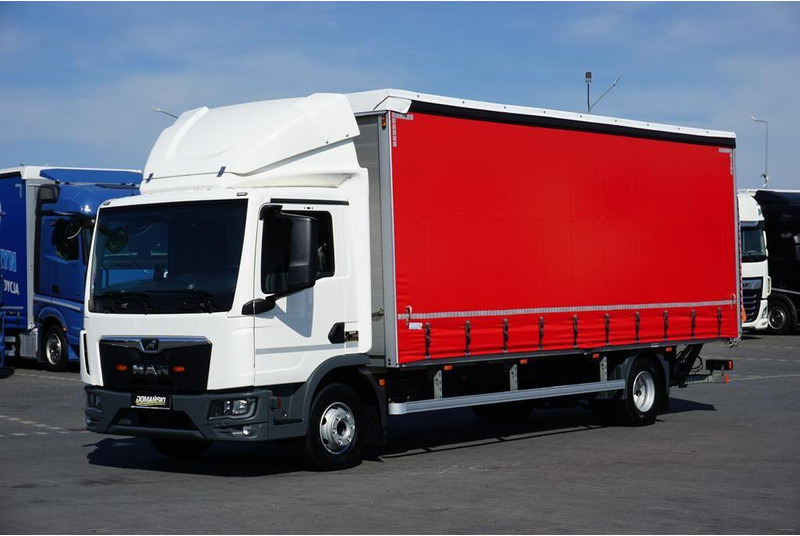 MAN TGL / 12.190 / E 6 / FIRANKA + WINDA / ŁAD. 6 525 KG / 16 PALET - Kravas automašīna ar tentu: foto 1 MAN TGL / 12.190 / E 6 / FIRANKA + WINDA / ŁAD. 6 525 KG / 16 PALET - Kravas automašīna ar tentu: foto 1