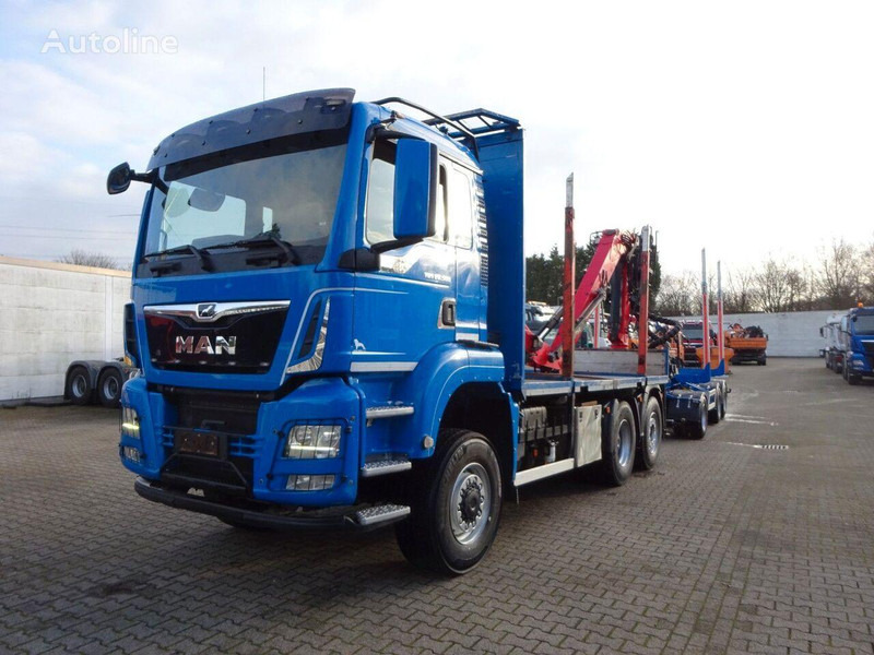 MAN TGS 28.500 6x4 Log truck + Crane Epsilon + Trailer - Kokvedējs, Kravas auto ar manipulatoru: foto 1 MAN TGS 28.500 6x4 Log truck + Crane Epsilon + Trailer - Kokvedējs, Kravas auto ar manipulatoru: foto 1