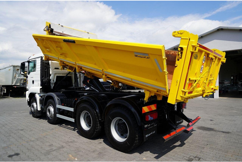 MAN TGS 41.460 / 8x8 / WYWROTKA / 2 STRONNA / BORDMATIC / HYDROBURTA - Kravas automašīna pašizgāzējs: foto 4 MAN TGS 41.460 / 8x8 / WYWROTKA / 2 STRONNA / BORDMATIC / HYDROBURTA - Kravas automašīna pašizgāzējs: foto 4