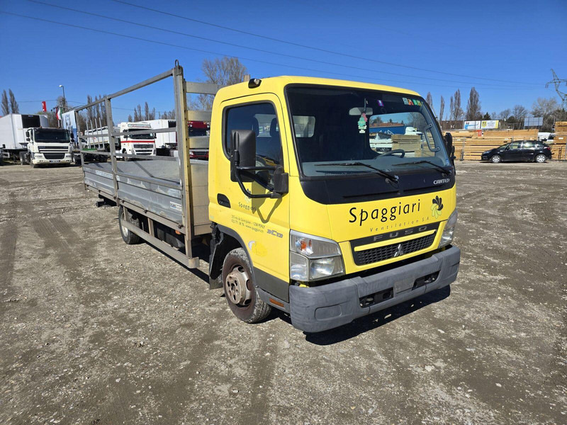 Mitsubishi Canter 3,0 d - Pritsche - Automašīna ar kravas platformu: foto 1 Mitsubishi Canter 3,0 d - Pritsche - Automašīna ar kravas platformu: foto 1