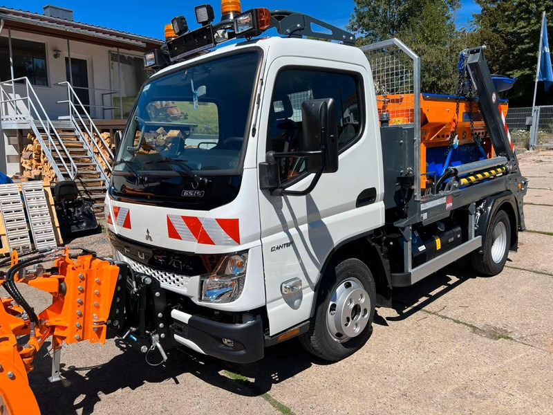 Mitsubishi Fuso Canter 6S15 - Skip loader truck - Būvgružu konteineru vedējs: foto 1 Mitsubishi Fuso Canter 6S15 - Skip loader truck - Būvgružu konteineru vedējs: foto 1