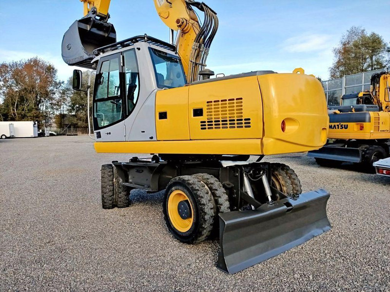 New Holland WE 190 - Riteņu ekskavators: foto 3 New Holland WE 190 - Riteņu ekskavators: foto 3