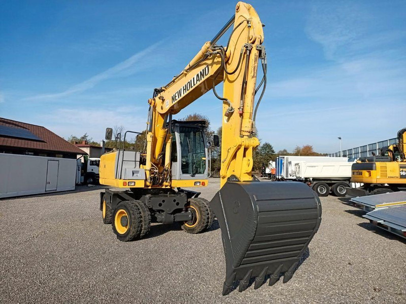New Holland WE 190 - Riteņu ekskavators: foto 5 New Holland WE 190 - Riteņu ekskavators: foto 5