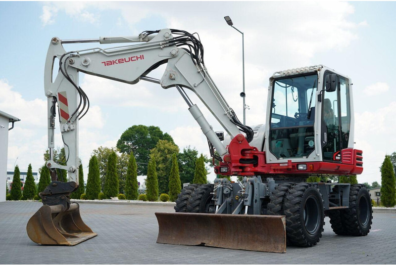 Takeuchi TB 295 W / KOPARKA KOŁOWA / 2016 ROK / PO KONTRAKCIE SERWISOWYM - Riteņu ekskavators: foto 1 Takeuchi TB 295 W / KOPARKA KOŁOWA / 2016 ROK / PO KONTRAKCIE SERWISOWYM - Riteņu ekskavators: foto 1