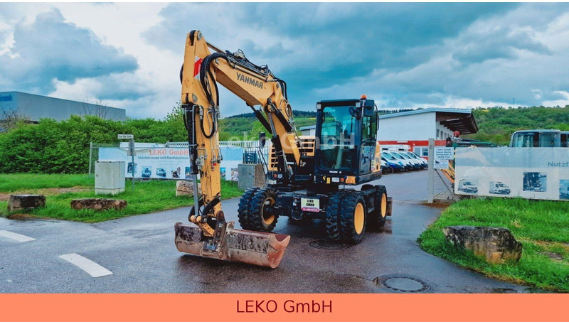 Yanmar B 95W Mit Drei Löffeln und Ein Hammer - Riteņu ekskavators: foto 3 Yanmar B 95W Mit Drei Löffeln und Ein Hammer - Riteņu ekskavators: foto 3