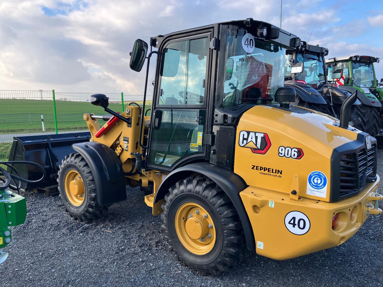 Caterpillar 906 - Riteņu iekrāvējs: foto 3 Caterpillar 906 - Riteņu iekrāvējs: foto 3
