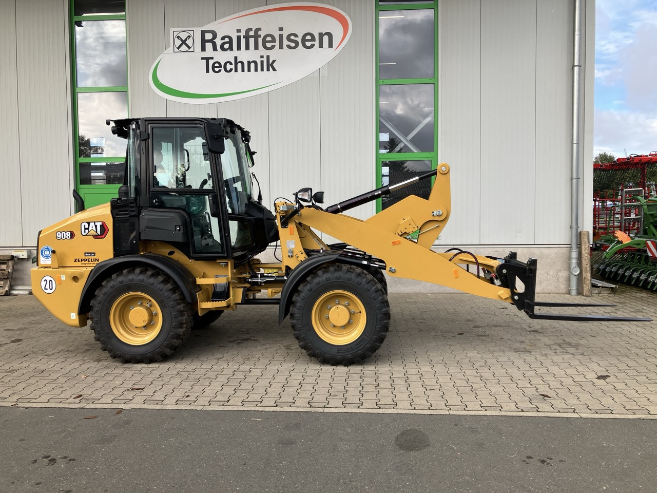 Caterpillar 908 HL - Riteņu iekrāvējs: foto 1 Caterpillar 908 HL - Riteņu iekrāvējs: foto 1