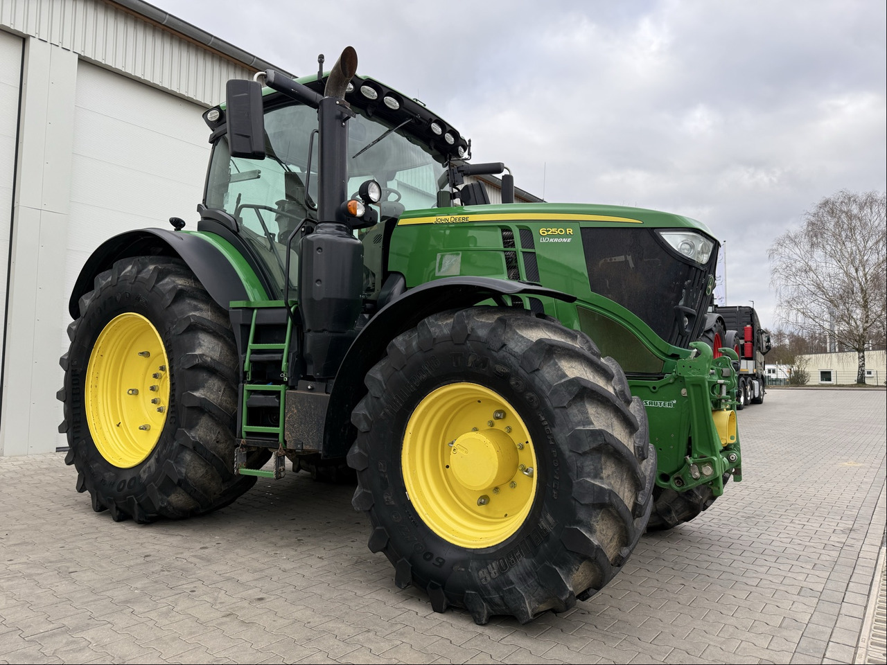 John Deere 6250 R - Traktors: foto 1 John Deere 6250 R - Traktors: foto 1