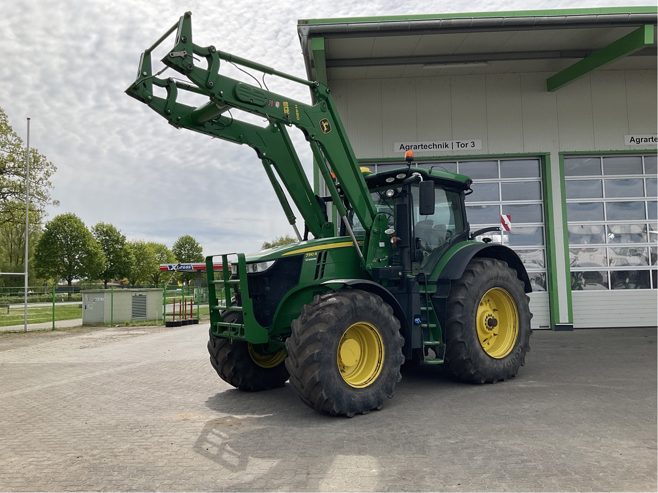 John Deere 7310 R - Traktors: foto 1 John Deere 7310 R - Traktors: foto 1